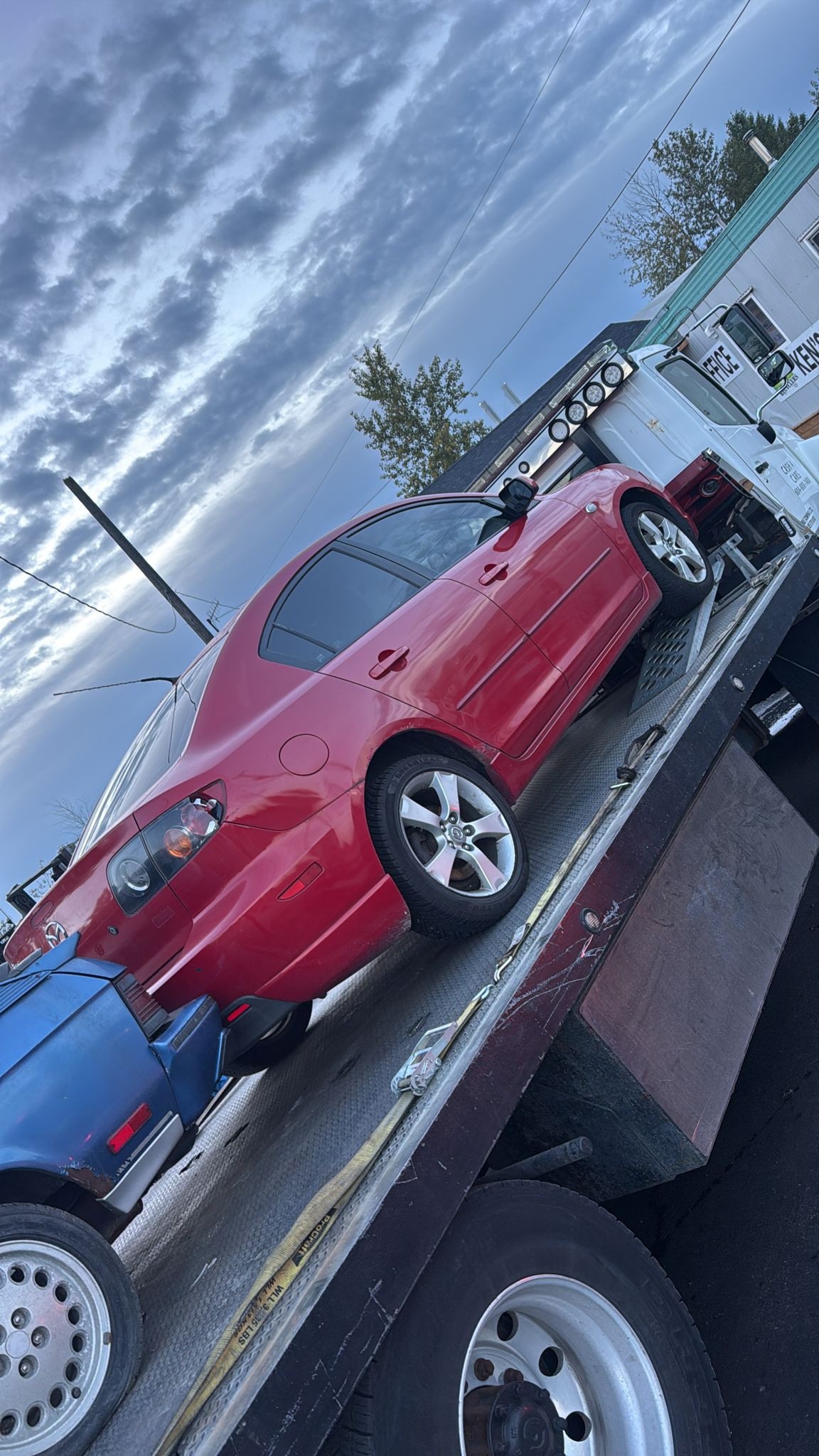 Broken vehicle loaded for removal in East Vancouver